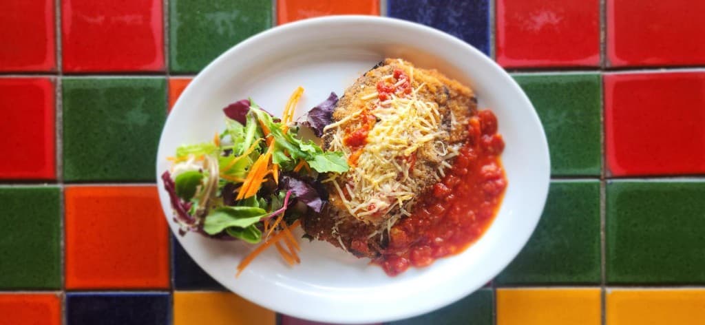 Eggplant parmesan with marinara and parmesan at Bacchus, Italian restaurant in Richmond VA